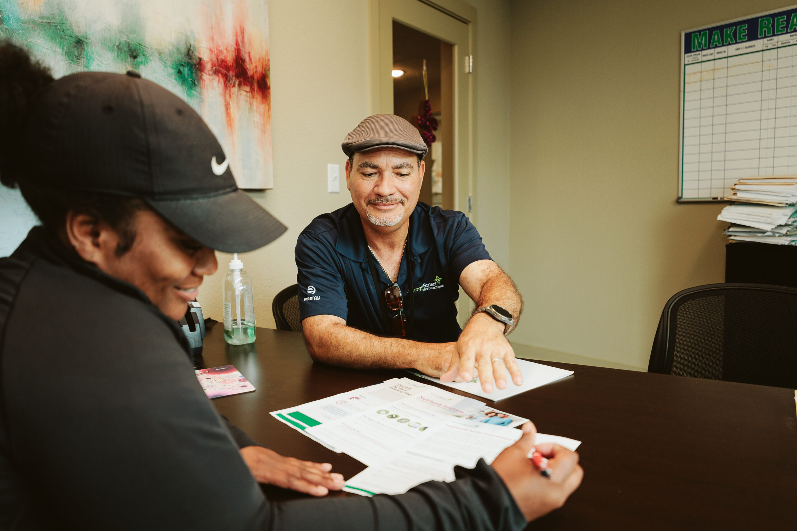 Energy Smart energy advisor talking with customer about Multifamily energy savings